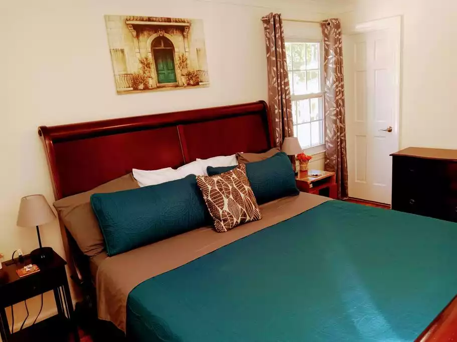The master bedroom has an ensuite bathroom The master bedroom has an ensuite bathroom - Cheerful Family-Friendly Home: Ample Outdoor Space - Raleigh
