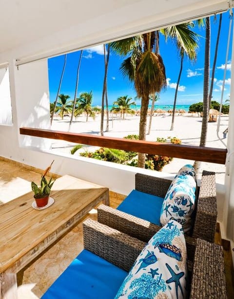 Lounge on your private patio while soaking up the beachfront view.