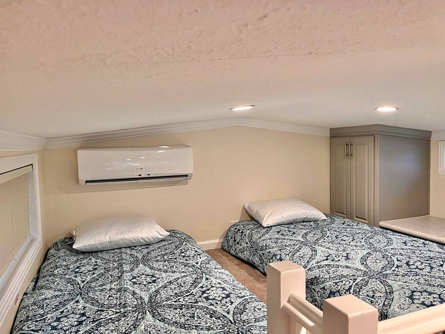 2 twin memory foam mattresses in the loft