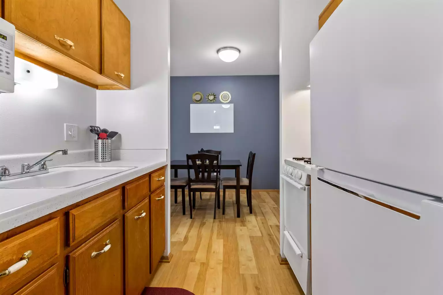 Whiteboard in the dining room. Dry erase markers are on the office desk.