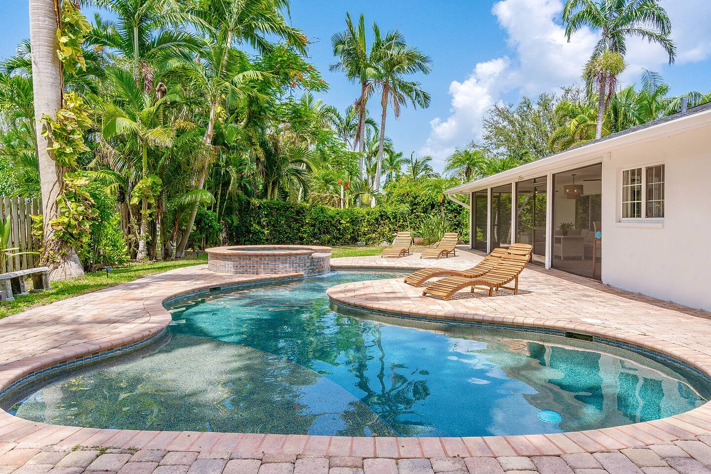 Take a dip in the resort style pool with tanning ledge/Baja shelf and in pool seating or in the serene waterfall spa.