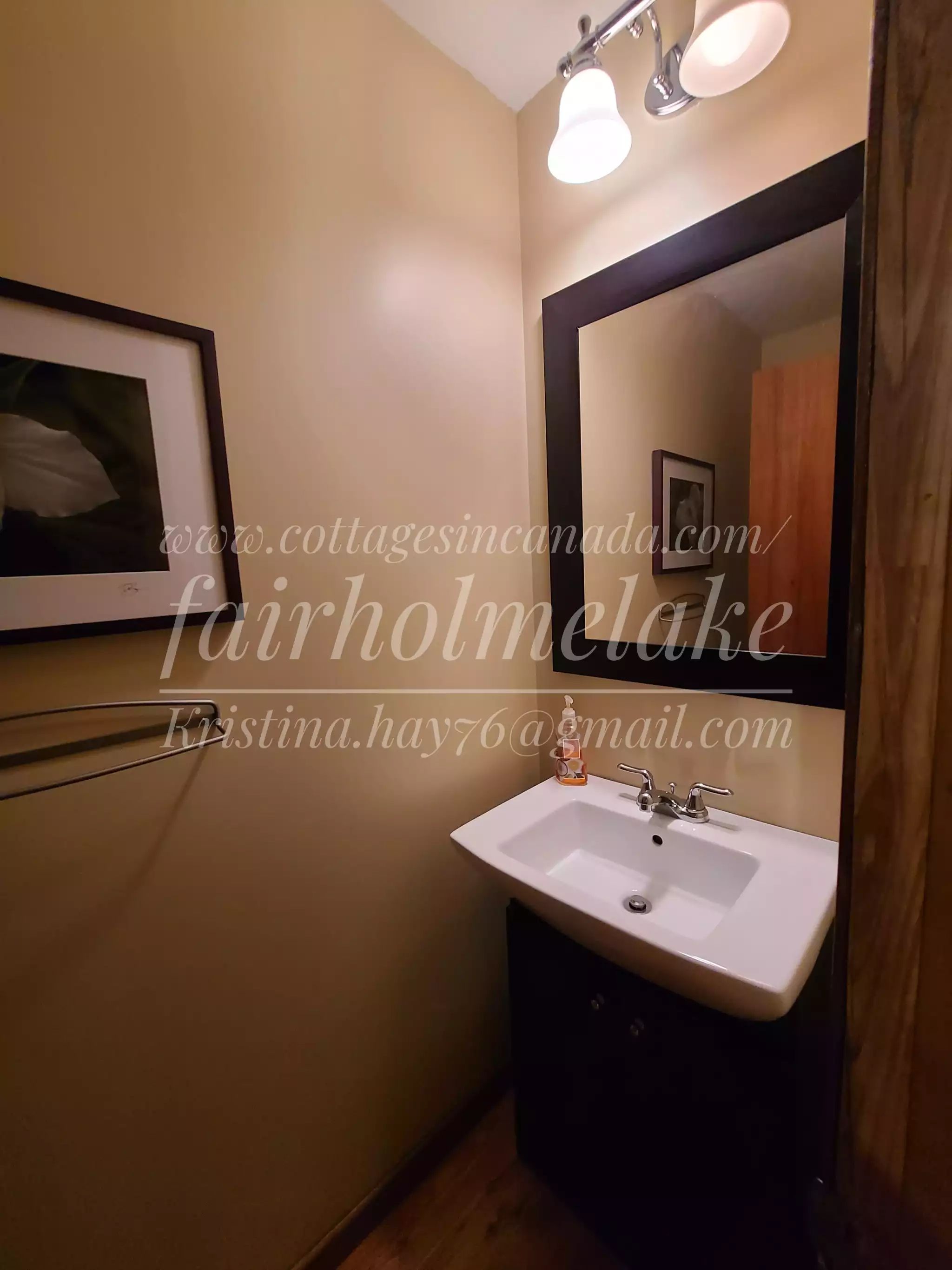 2 pc bathroom on main floor - Fairholme Lake Cottage Rental - Whitestone