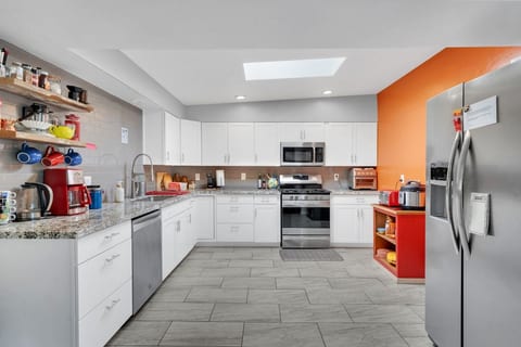 A massive kitchen, well-stocked and ready for use.