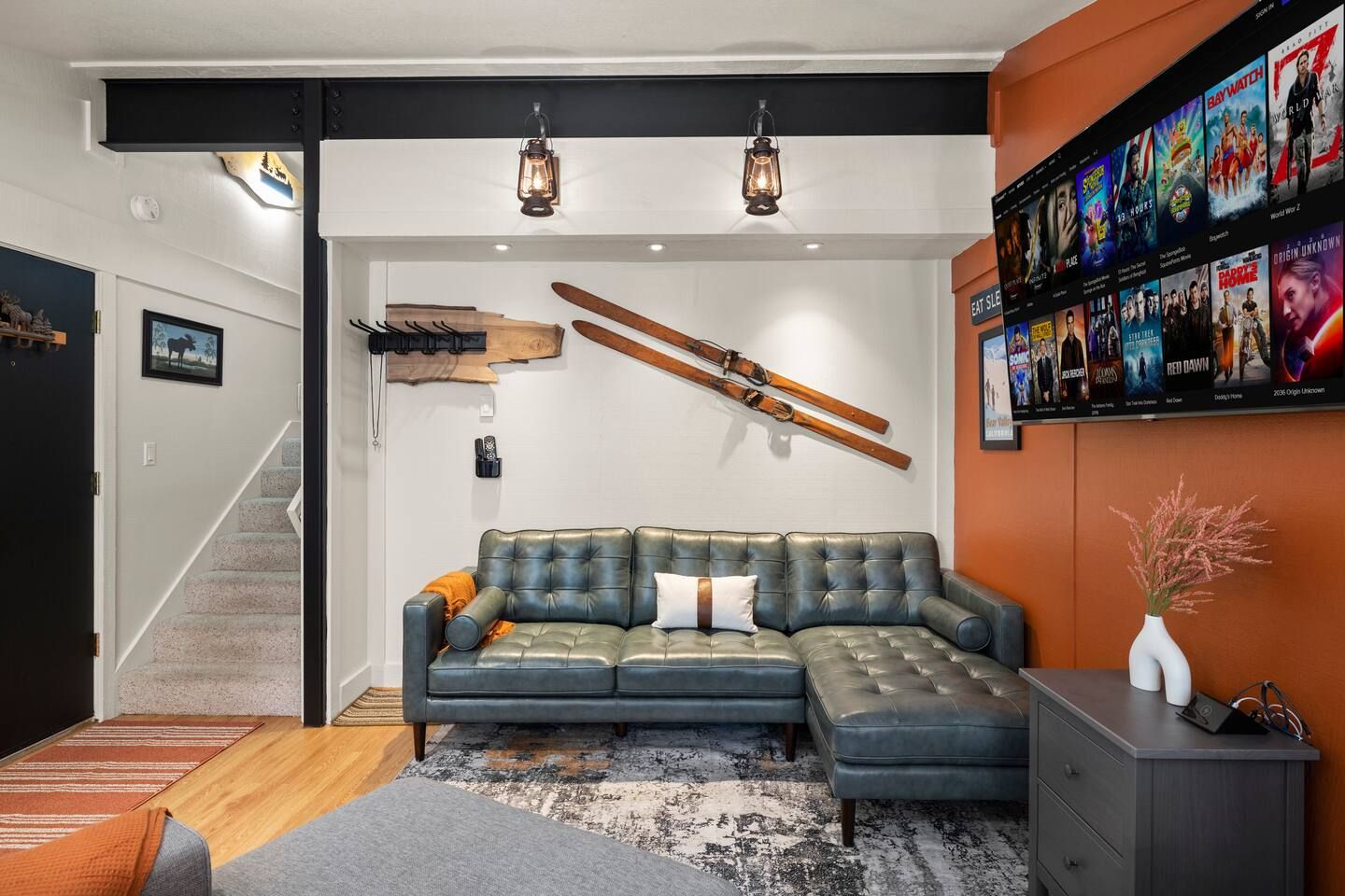 New Leather Sofas, 65" LG Smart TV, Additional Lights, New Paint. Relax while watching your favorite shows.