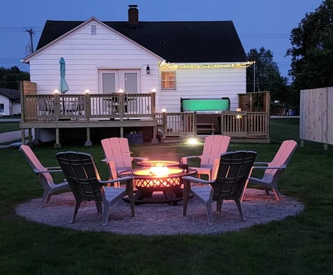Deck, hot tub, tables and chairs, gas grill, firepit. Some firewood is provided. If you need to purchase more, there is a firewood stand by the road.