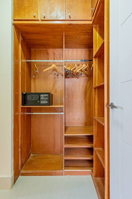 Master closet has a lot of storage and hangers for your use!