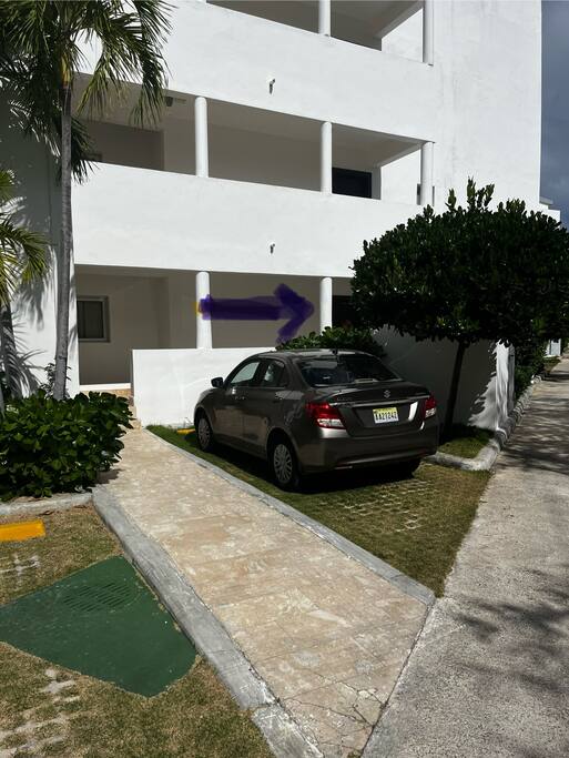 Parking right out front! Notice the door annotated with the arrow.... Just a couple steps up - if necessary, you can go to the end of the building to access the same hallway without the steps. No climbing stairs to an upper floor! Easy access!