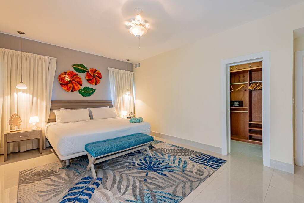 From the master bedroom you have access to a large closet with hangers and a safe.... to the left of the closet is the full bathroom.