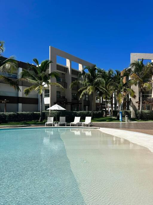 The gentle sloped "beach" entrance to the pool