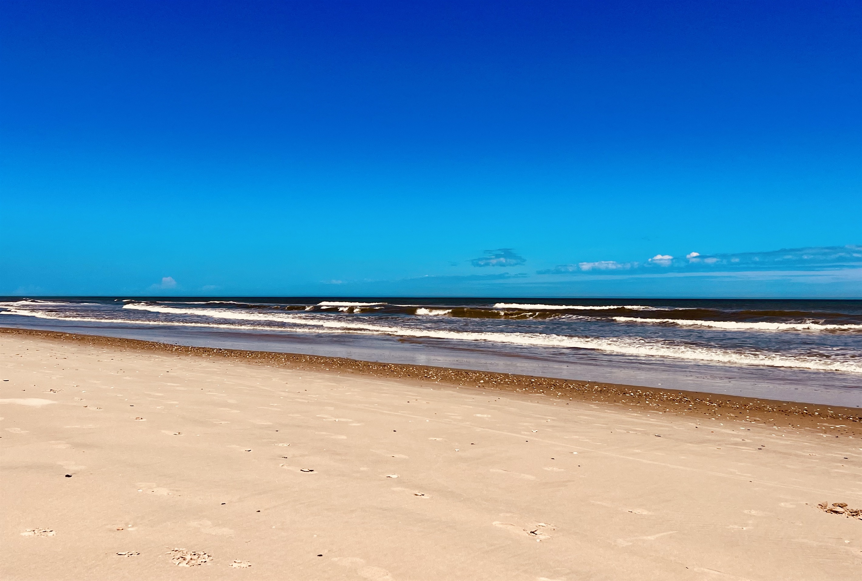 Beach with calming waves.