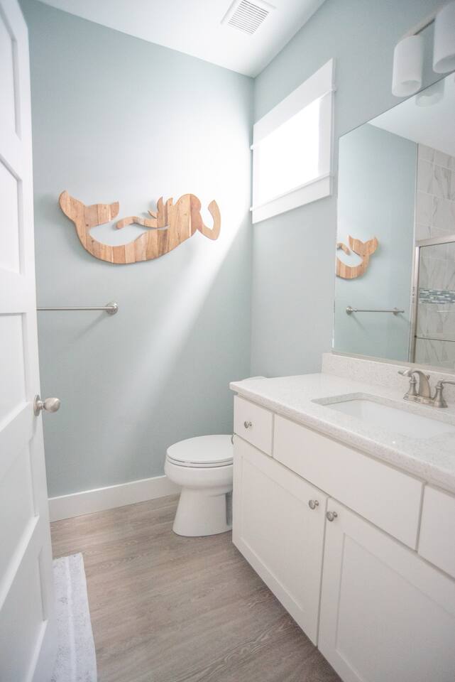 Elevate your daily routine in this exquisitely designed, white paradise.