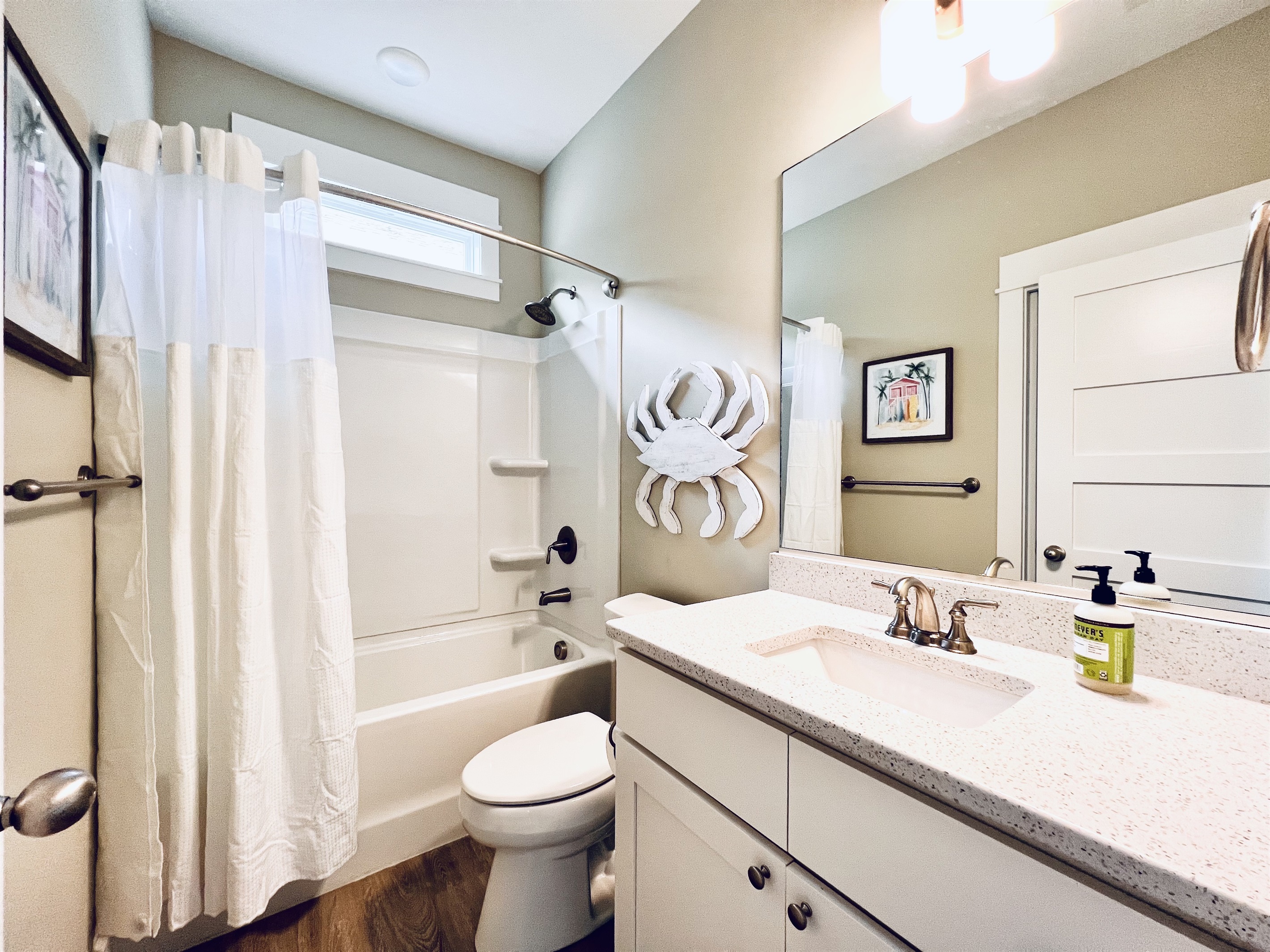 Indulge in the epitome of elegance with a stunning, all-white bathroom.