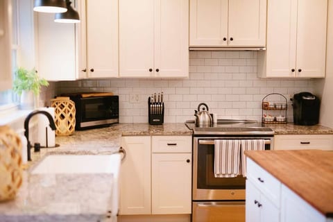 Updated kitchen and island…so much counter space. Don’t forget your complimentary Keurig coffee and teas!