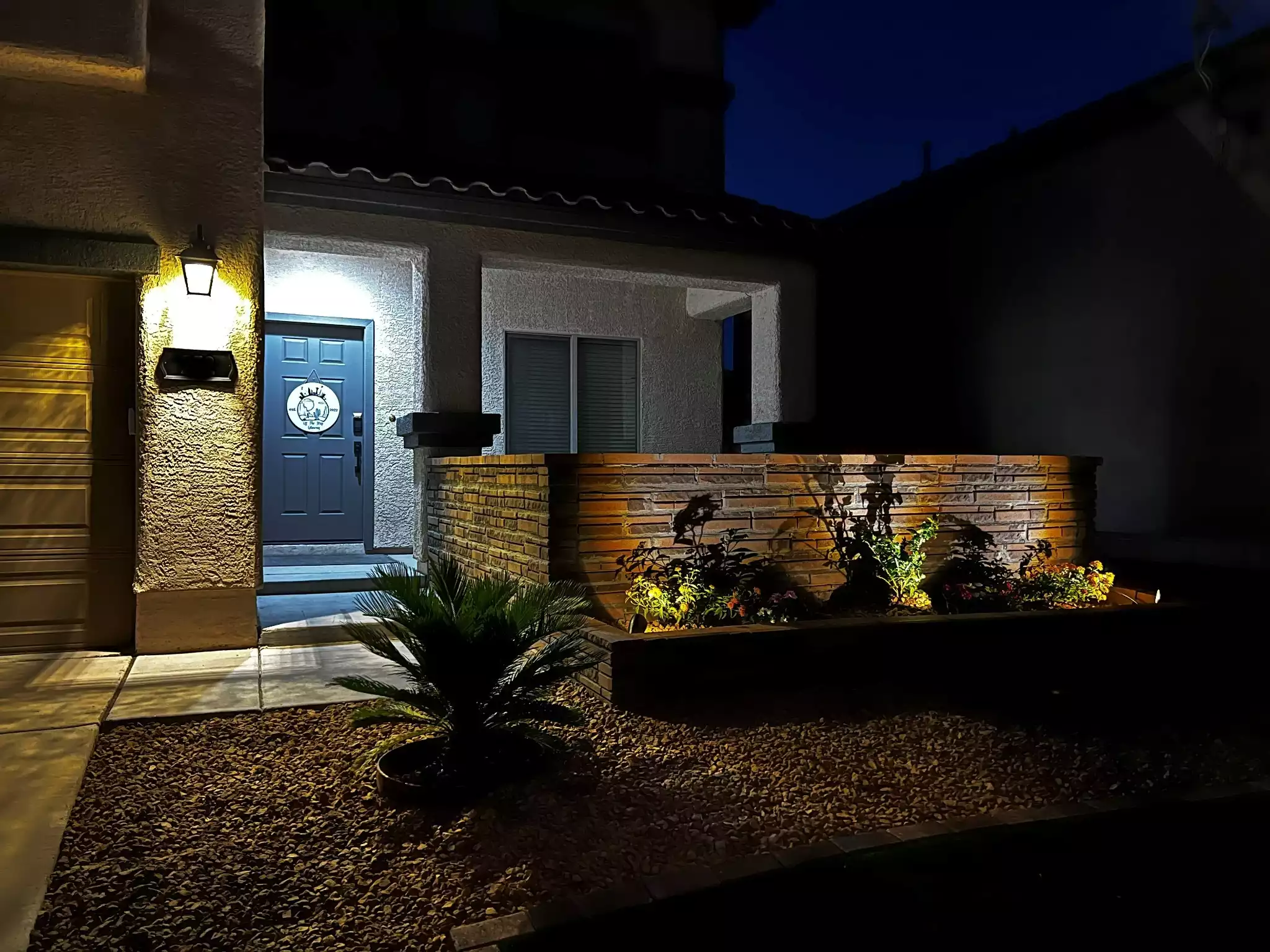 Front door & front porch area at night. - 5 Bed 3 Ba house w/ PRIVATE SALT POOL & EV Charger - Henderson