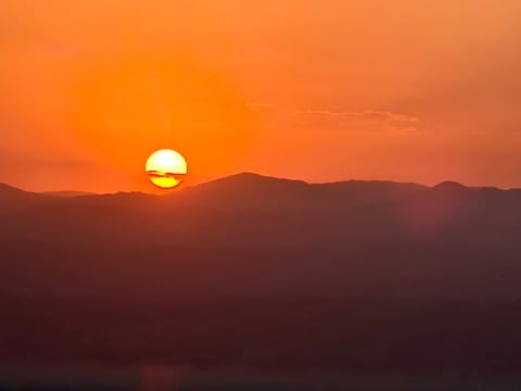 See stunning sunsets (taken June).