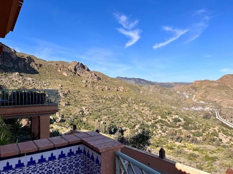 Private balcony with seating off the Samira Twin