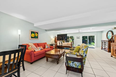 Go to the beach from expansive heated pool home
