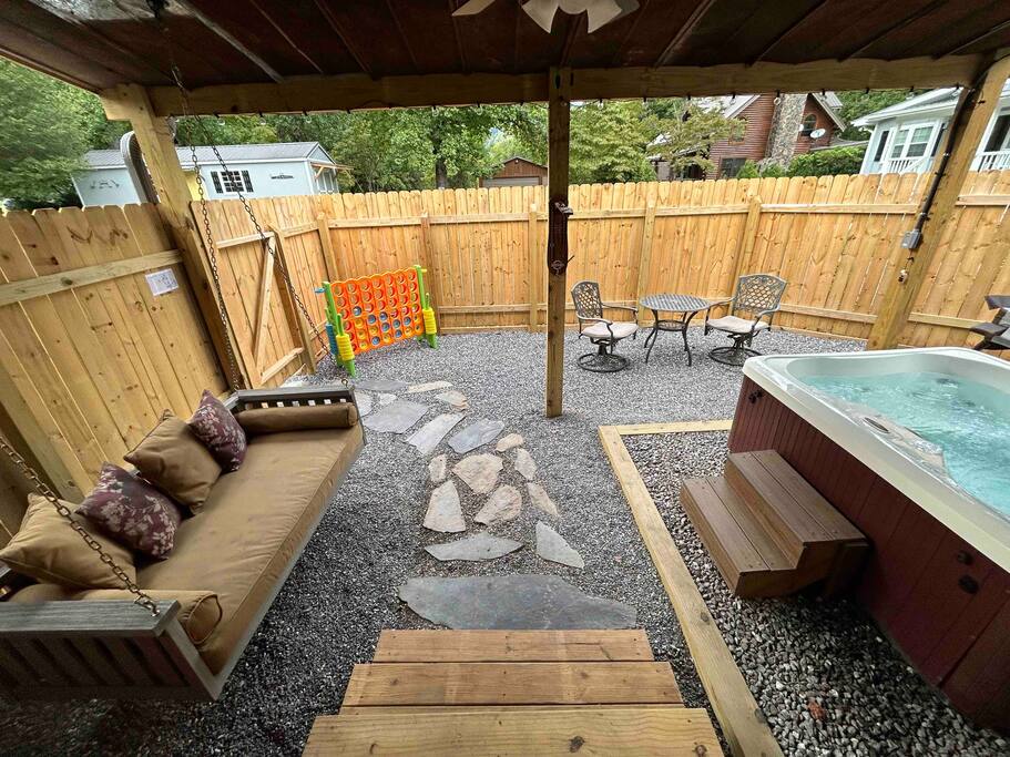 private hot tub at vacation tiny house near Deep Creek and GSM Railroad private hot tub at vacation tiny house near Deep Creek and GSM Railroad - Cozy Retreat + Hot Tub + Near Town/Train/Breweries - 28713