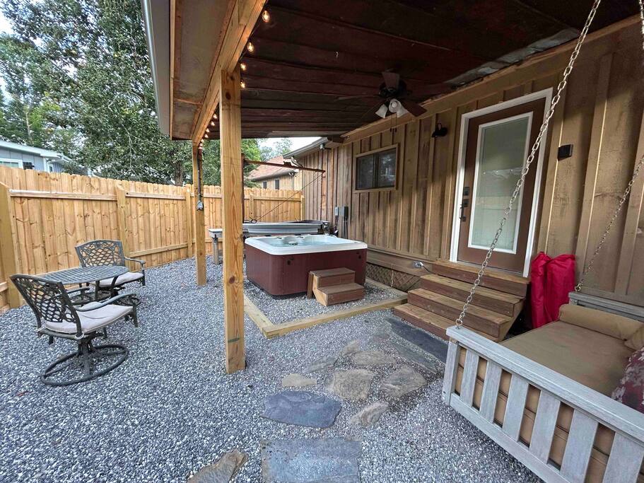 private backyard and private hot tub in this Great Smoky Mountain tiny home private backyard and private hot tub in this Great Smoky Mountain tiny home - Cozy Retreat + Hot Tub + Near Town/Train/Breweries - 28713