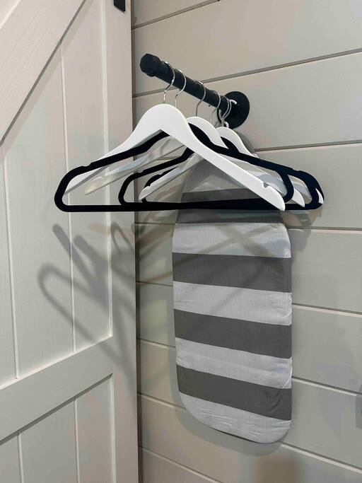 full bathroom with iron and ironing board full bathroom with iron and ironing board - Cozy Retreat + Hot Tub + Near Town/Train/Breweries - 28713