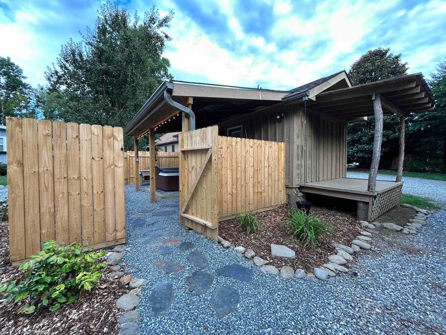 To enter the home, you will enter through the backyard gate into the private backyard area. To enter the home, you will enter through the backyard gate into the private backyard area. - Cozy Retreat + Hot Tub + Near Town/Train/Breweries - 28713