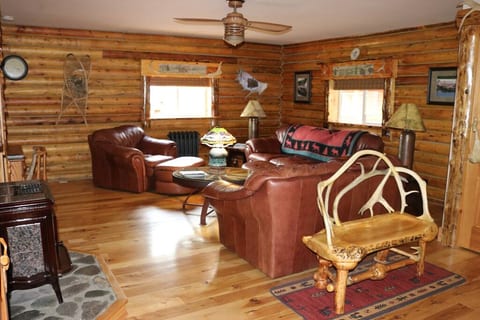 Indoor sitting area with gas fireplace.