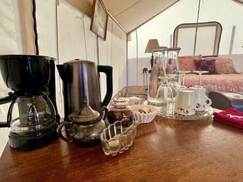 Coffee, tea, and water provided for guests.