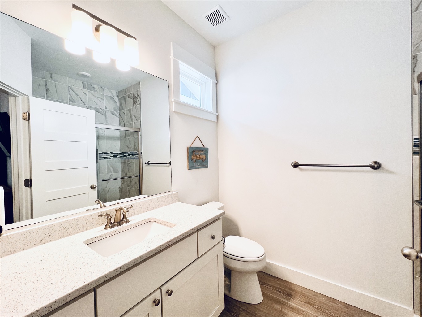 Step into sophistication and luxury in this elegant white-themed bathroom.