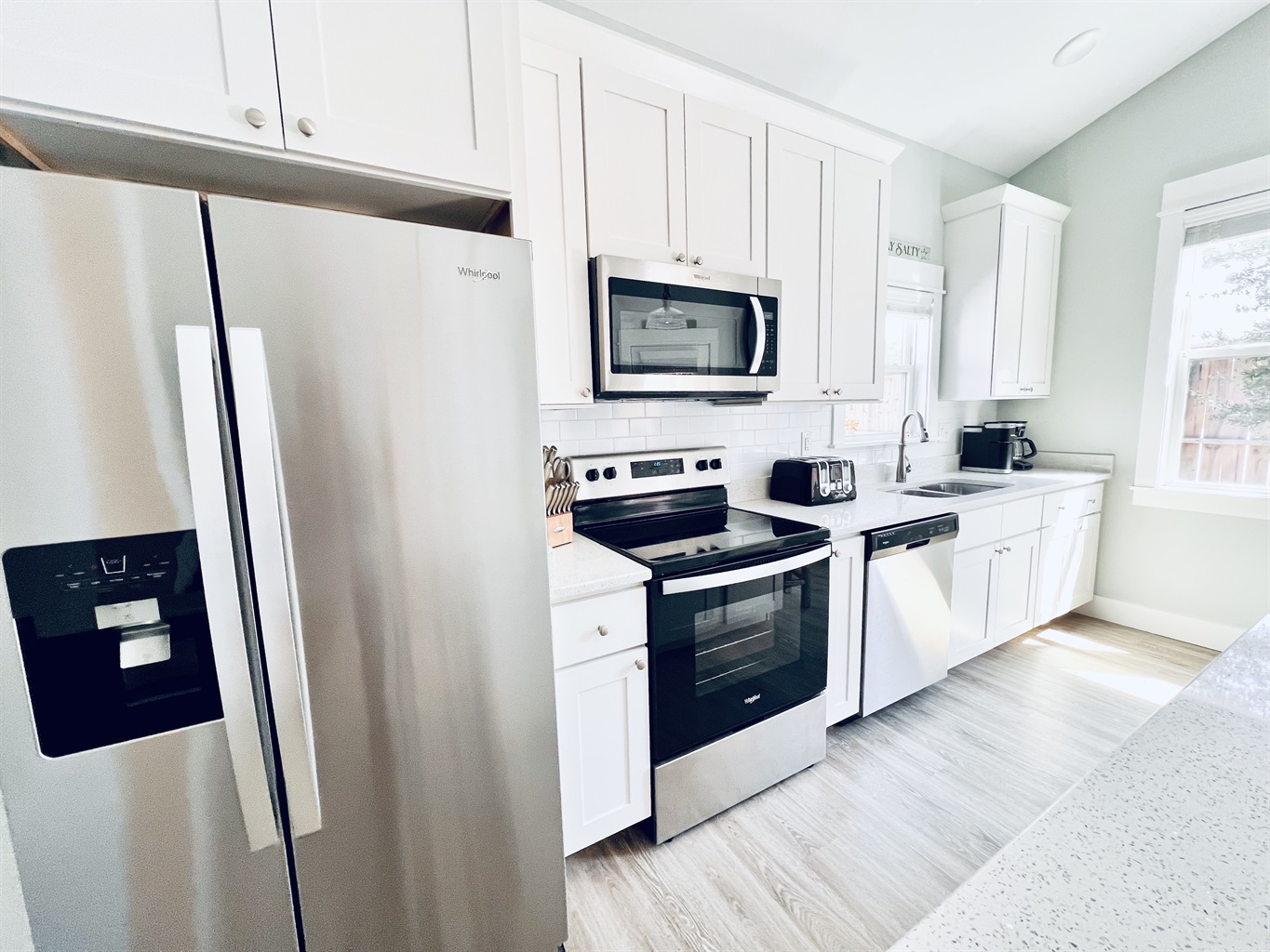 Your culinary canvas: a white-themed kitchen ready for your culinary masterpieces.