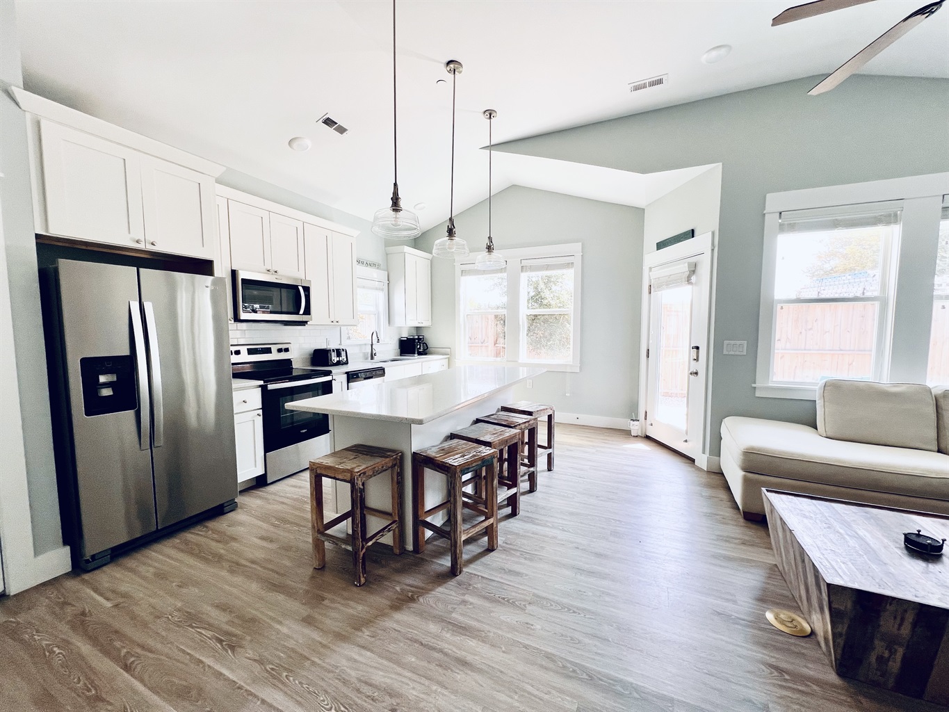 A chef's dream come true – a pristine, fully equipped white kitchen awaits you.