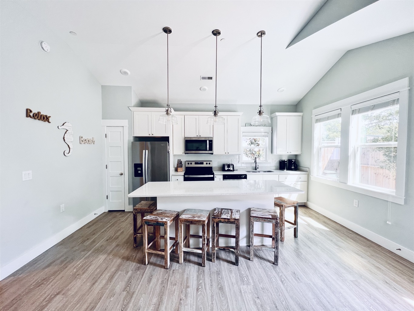 "Cooking in style has never been easier in this fully stocked, white-themed kitchen.