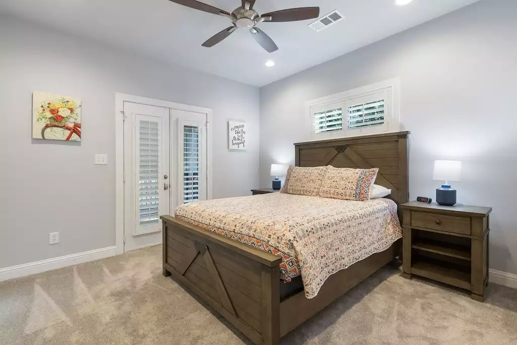 Bedroom #5 also has balcony access. All 4 bedrooms have walk-in closets. - Main House at Whispering Oaks Estate - Dripping Springs