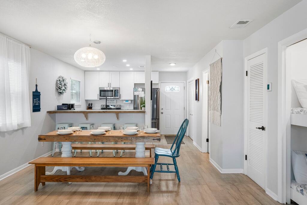 A dining table that accommodates six people. We also offer stools for seating at the counter.