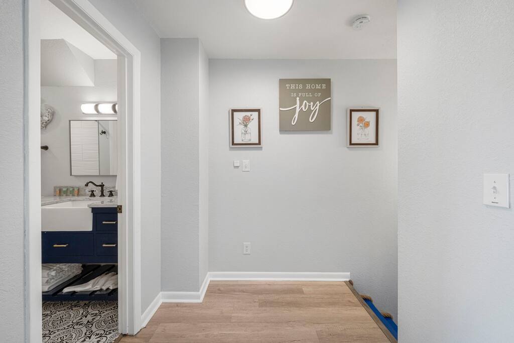 Hallway on the 2nd floor with the bathroom on the left