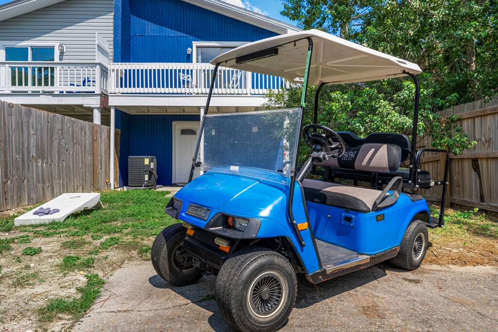 A complimentary golf cart is available for eligible guests to travel between the house and the nearby beach. 