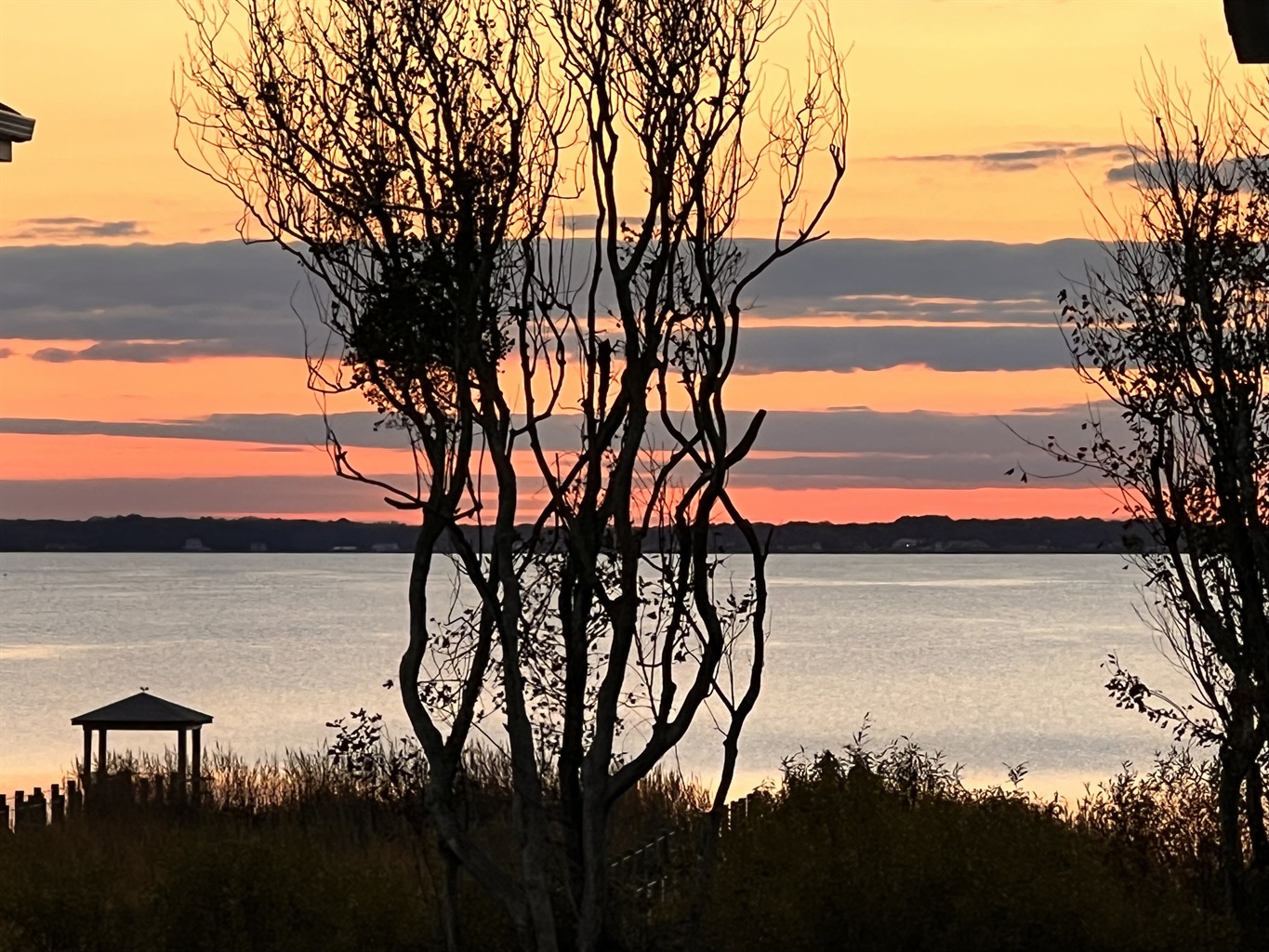 Sunset view from middle and top deck, living room and kitchen 