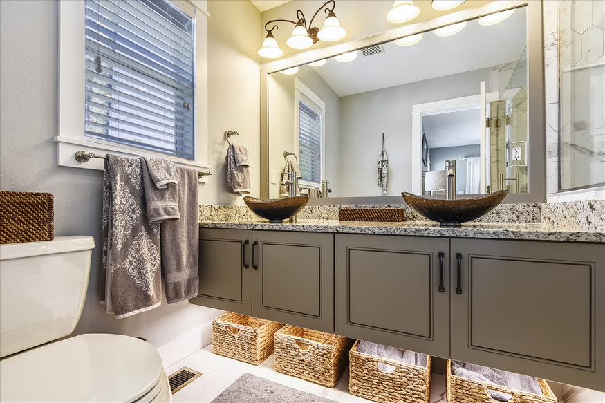 A stylish and elegant bathroom featuring two sinks for added convenience.