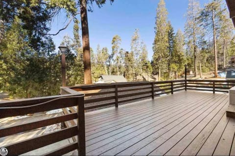Front Porch to Cabin- Summertime enjoy sitting on the porch on comfy outdoor seating with a propane firepit.