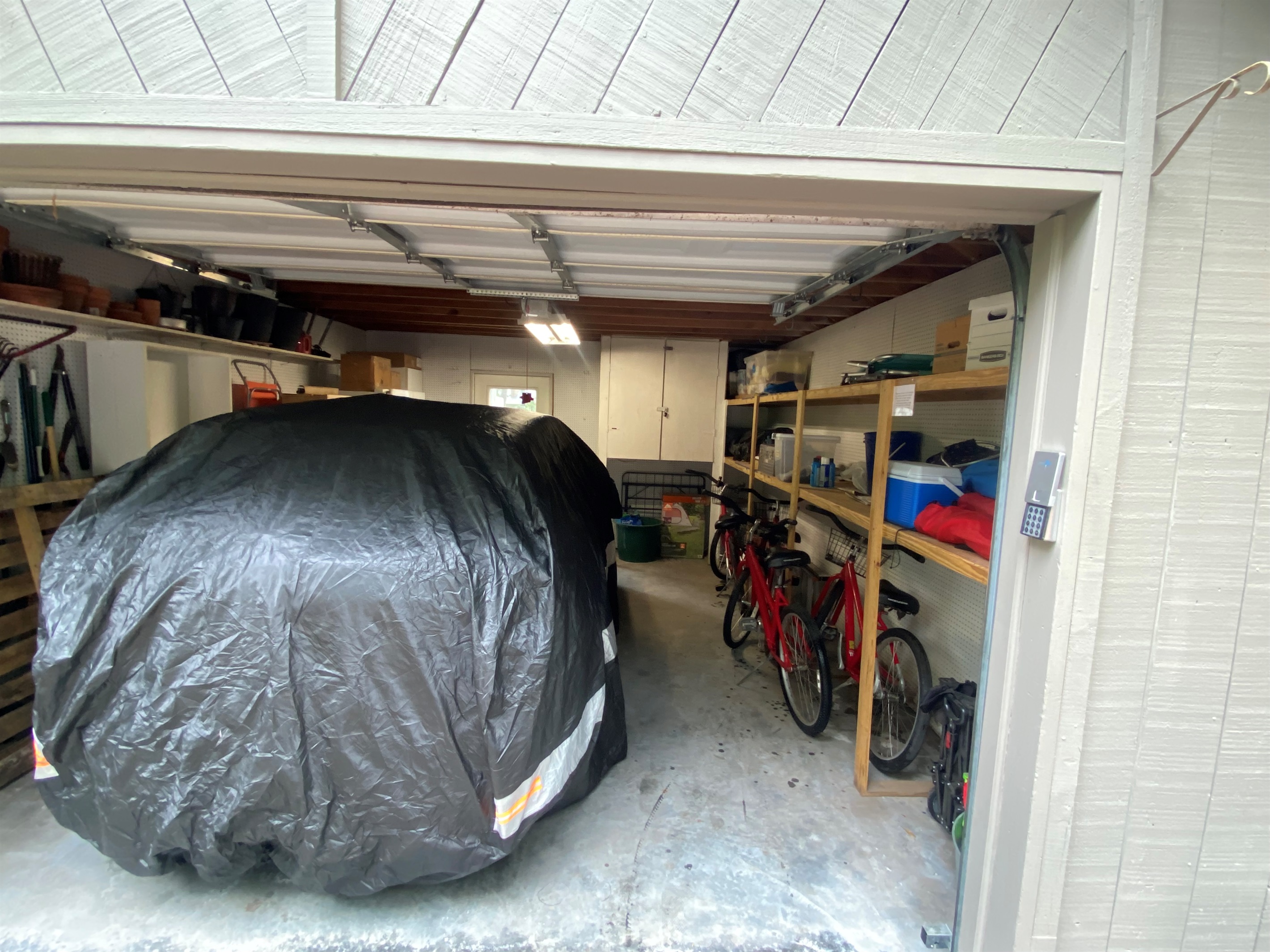 Garage has owners car inside