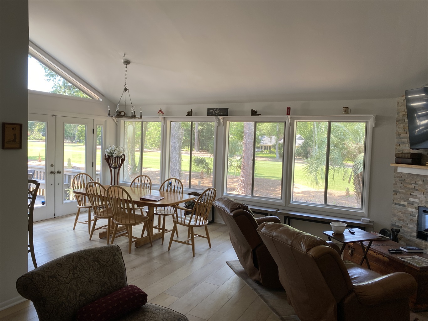 Wall of windows into back of the 2nd fairway