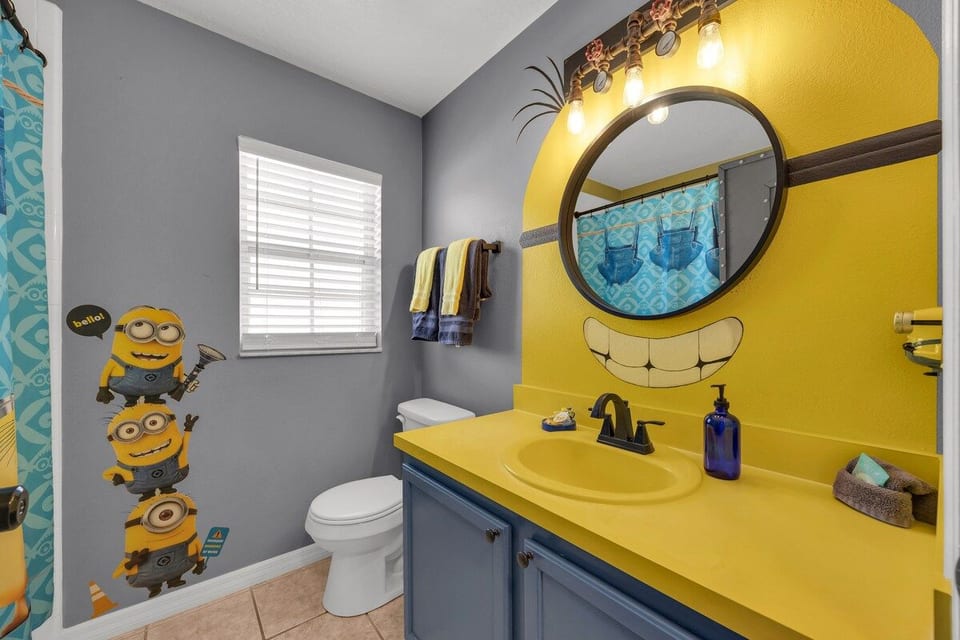 Even tooth-brushing is an adventure in this custom Minion bathroom! A hit with the little ones, it features a tub / shower combo—perfect for easy bath times after a long day at Disney.