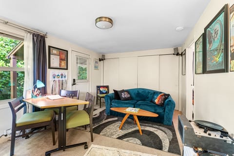 The River Room — cozy, music-filled, and full of light.