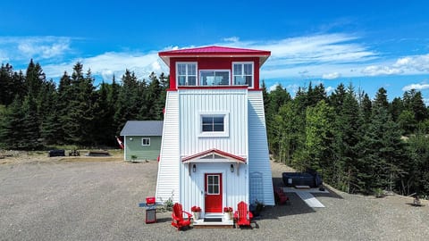 Lighthouse with view of mechanical building/laundry in the background