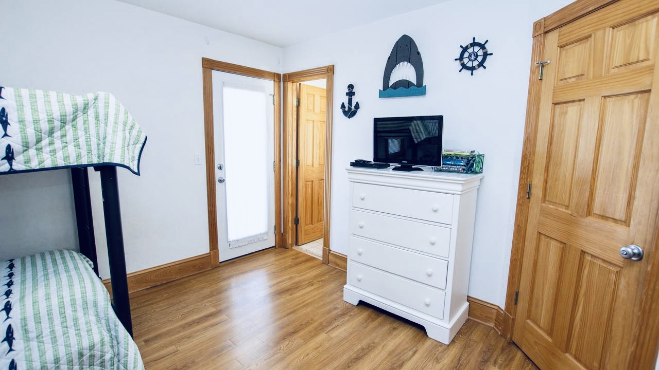 smart Tv and dresser.