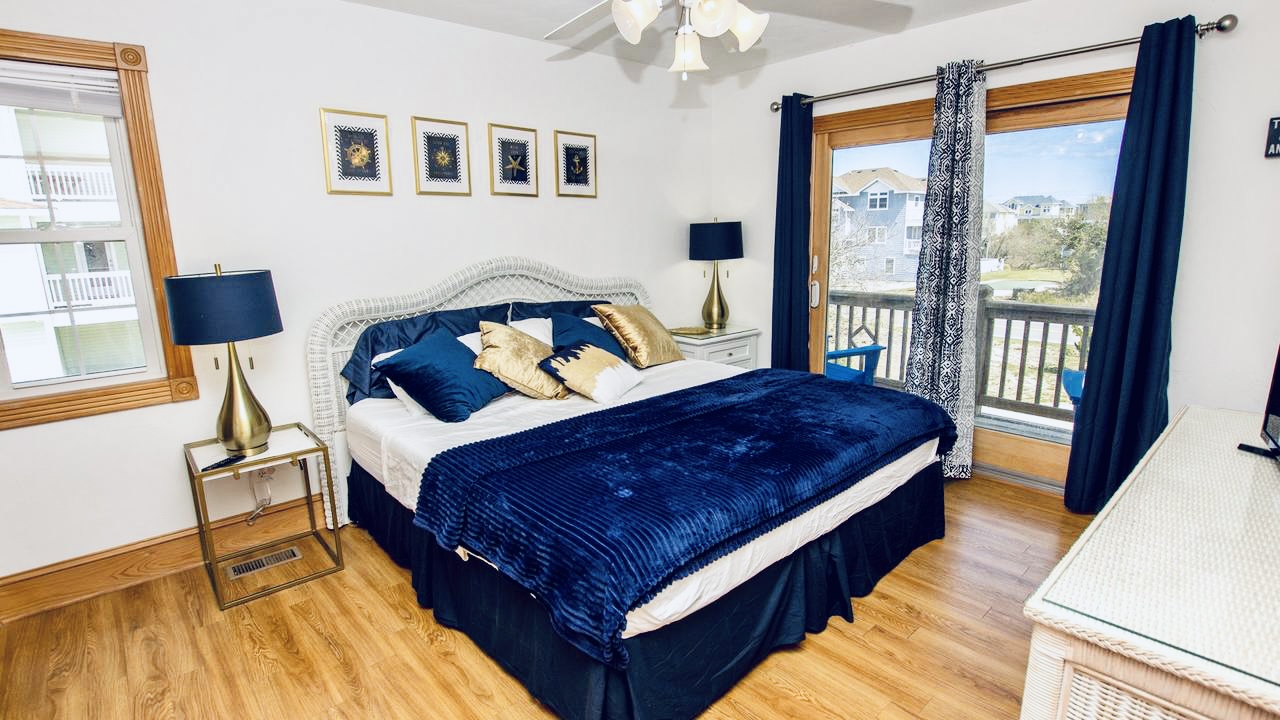 King Master, Chic bedroom with a soothing blue and white palette.