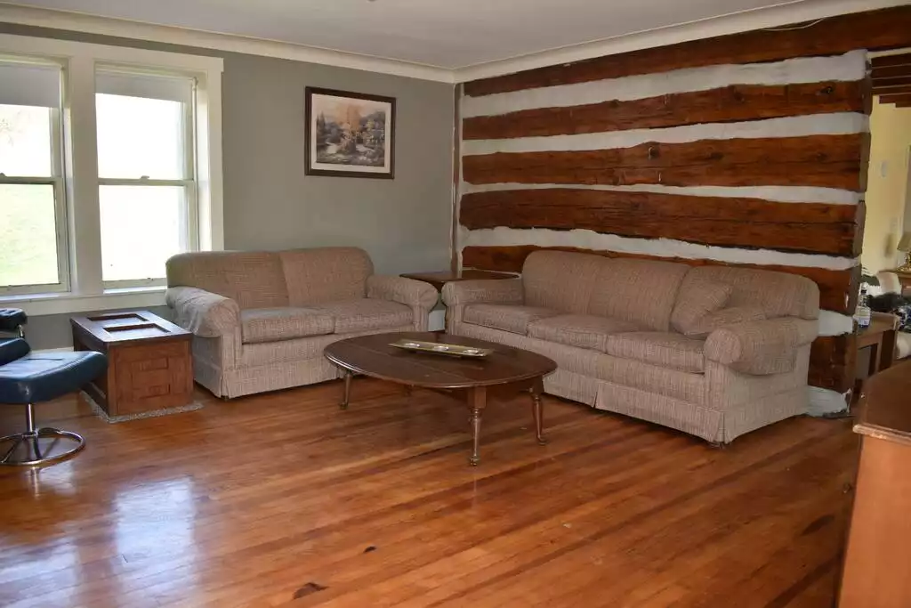 Living Room #1 with sleeper sofa - Raystown Farmhouse, <1mile to boat access. AC/wifi - James Creek