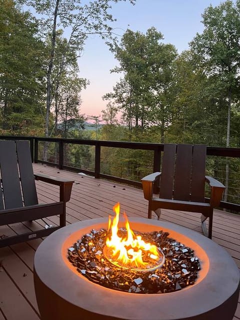 Gas fire pit area with seating for 6 overlooking the mountain view