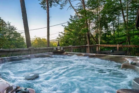 Relax outside in the hot tub with mountain views! Have your meals outside and enjoy the fresh air.