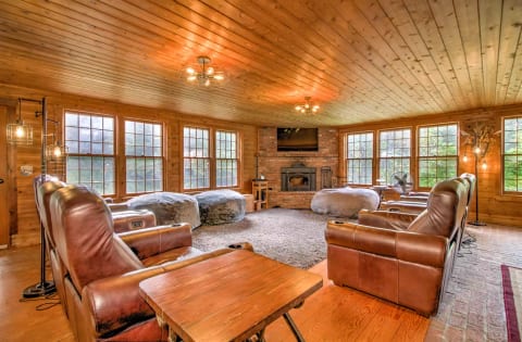 Relax by the fire in our 8 leather recliners & 3 bean bag chairs