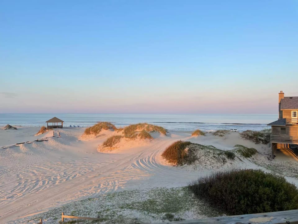 Dunes lit by sunset. Pic taken from back deck.